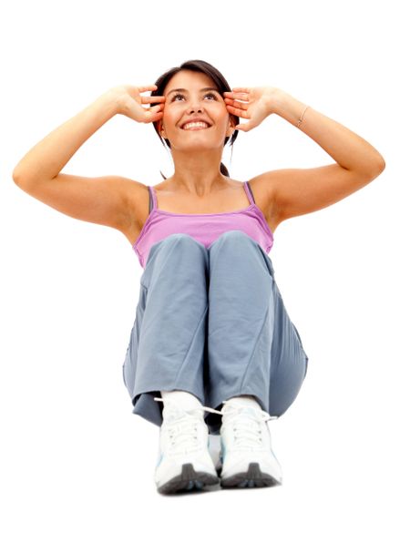 Fit woman exercising isolated over a white background