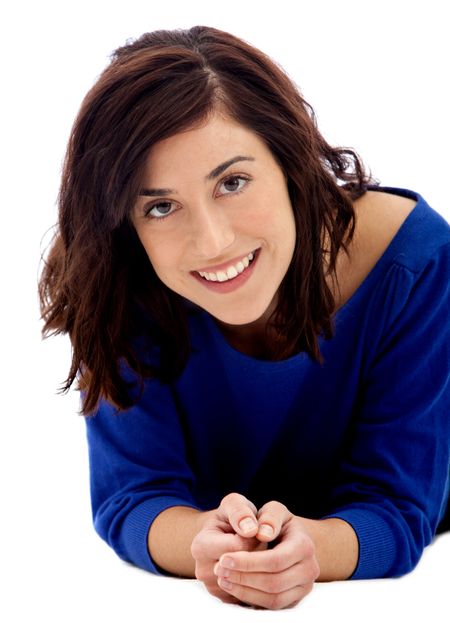 Woman lying on the floor isolated over a hwite background