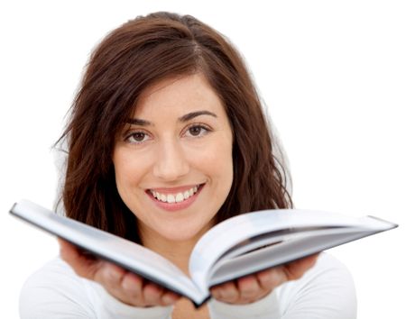 Woman holding a book open isolated over a white background