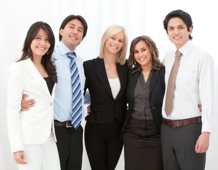 Happy group of business people smiling over a white background
