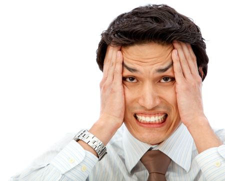 Stressful business man grabbing his head - isolated over a white background