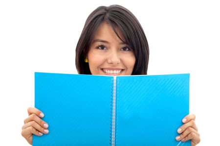 Beautiful female student with a notebook isolated over a white background