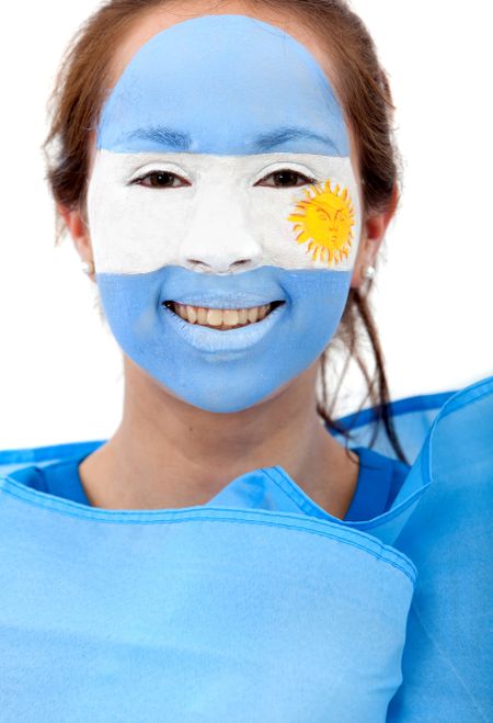 Portrait of a woman with the argentinian flag painted on her face isolated over white