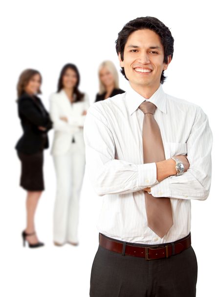 Friendly business man smiling with his team behind him isolated over a white background
