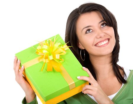 happy girl with a gift over a white background