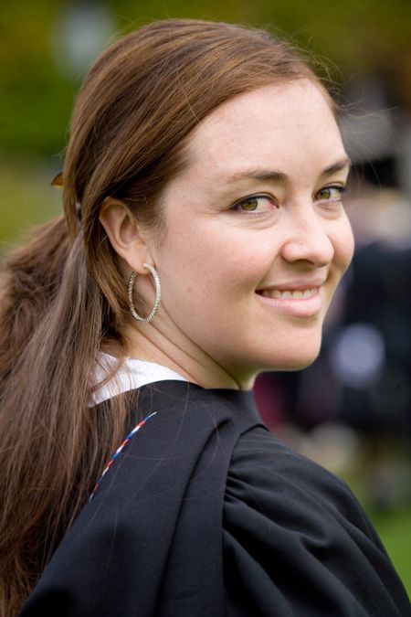 portrait of a female graduating at university
