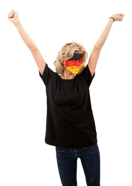 Portrait of a joyful woman with the german flag painted on her face isolated over white