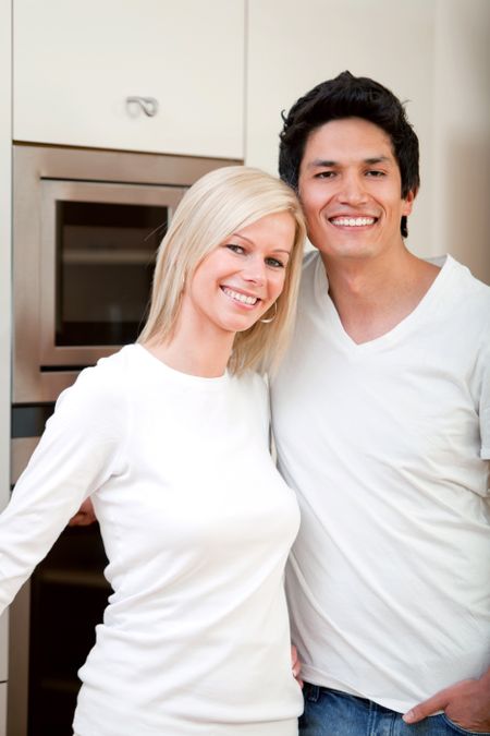 Beautiful couple portrait smiling at home