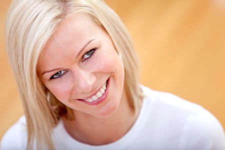 casual woman smiling and relaxing at home