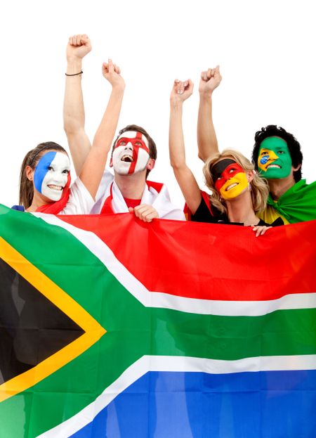 Football fans with painted faces holding the South African flag - isolated over a white background
