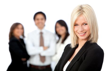 Business woman with a group behind - isolated over a white background