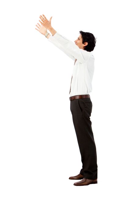 Business man holding something imaginary isolated over a white background