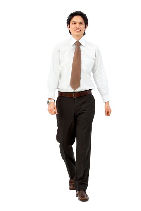 Business man walking isolated over a white background