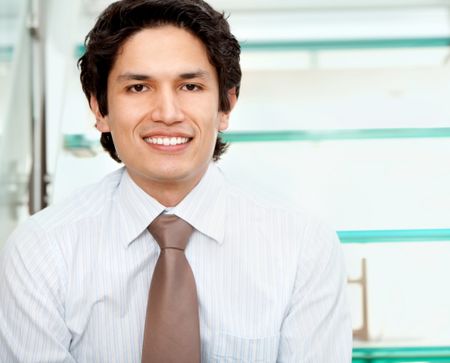 young business man smiling at the office