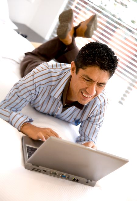 casual guy very relaxed working at home