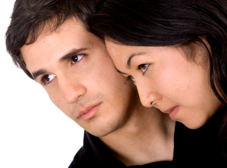 mixed ethnic couple of lovers with high expectations and aspirations - isolated over a white background