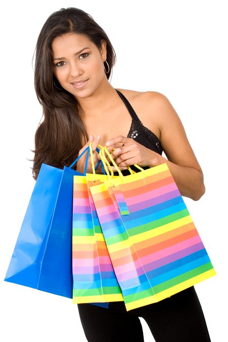 beautiful girl with shopping bags over a white background