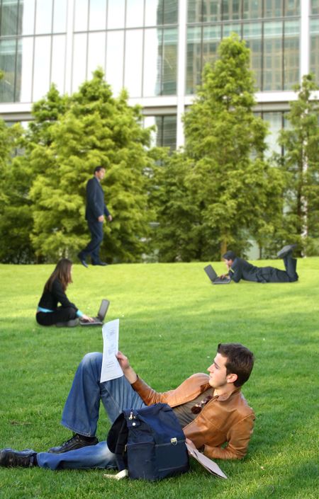 business environment with people on laptops or studying. Good image to represent freelance, or work from home businesses.