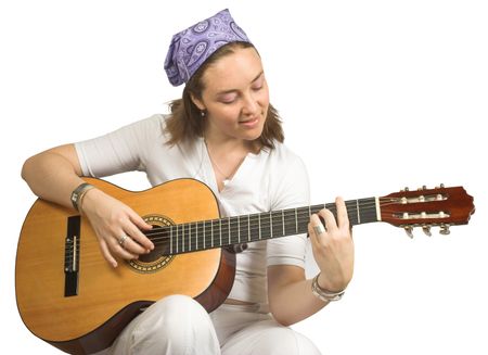casual woman playing the guitar