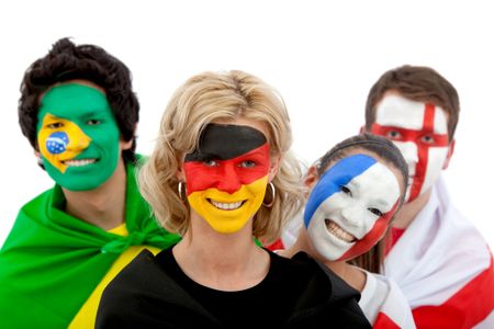 Group of  fans with painted faces isolated over a white background