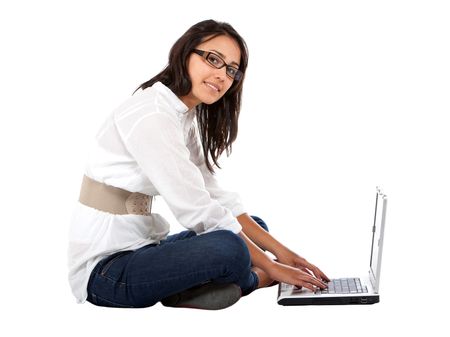 Young woman with a laptop isolated over a white background