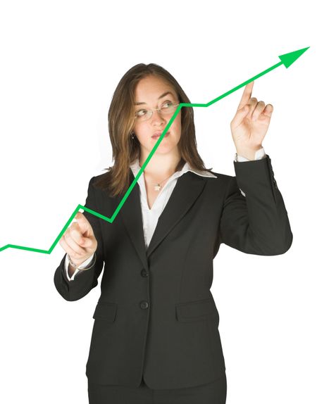 business woman pointing at a green graph
