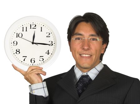 business man wearing glasses holding a clock next to his face showing lunch time approaching
