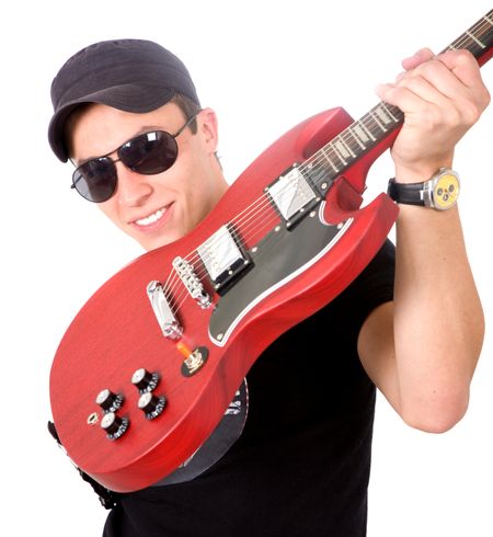 male electric guitar player smiling and wearing sunglasses over a white background