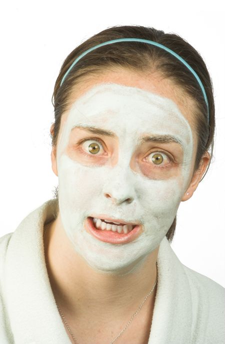 Casual woman with face mask- scary expression