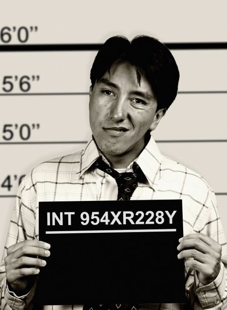 black and white mugshot of a man