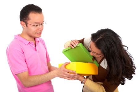 couple with a gift over a white background