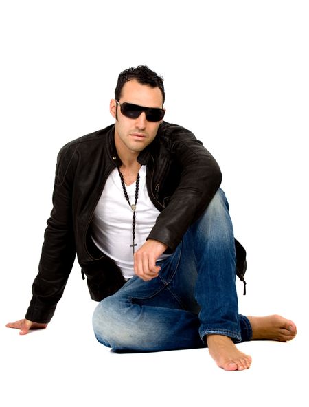 fashion male on the floor isolated over a white background