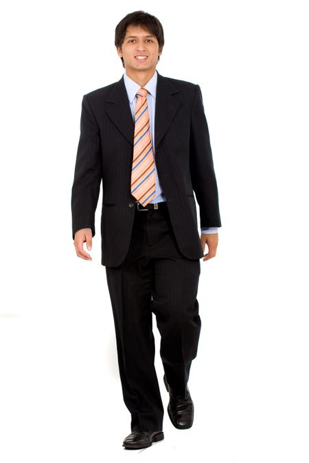 Business man walking towards the camera - isolated over a white background