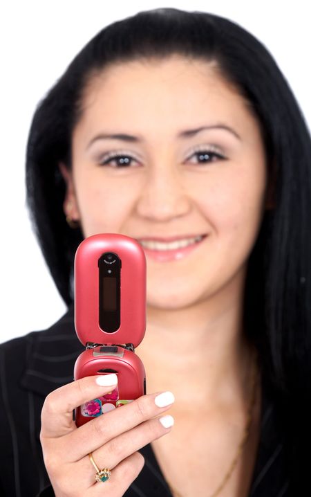 business woman sending an sms on her mobile phoen over a white background