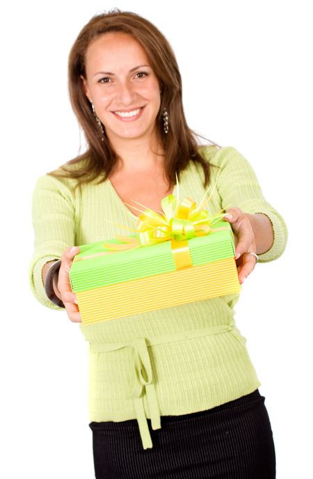 beautiful woman carrying a gift smiling over a white background