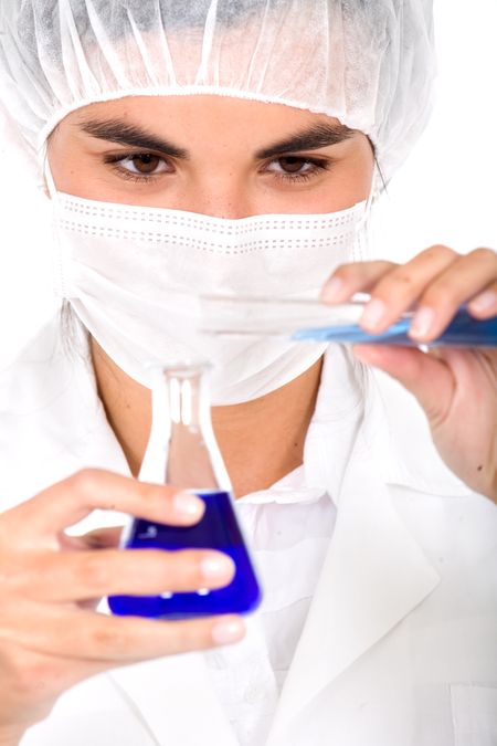 female chemist using test tubes over a white background