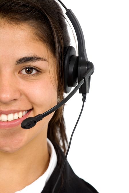customer service girl smiling with hand on headset - isolated over a white background