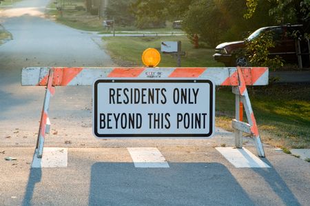 Sign: RESIDENTS ONLY BEYOND THIS POINT