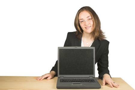 business woman on her desk with a laptop in front of her