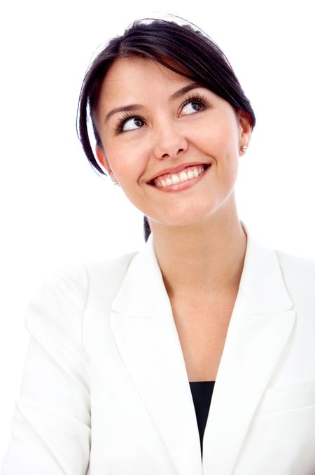 Thoughtful business woman with arms crossed - isolated over white