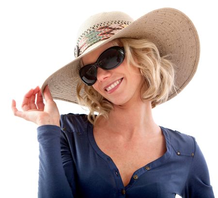 Summer woman wearing a hat and sunglasses  smiling ? isolated