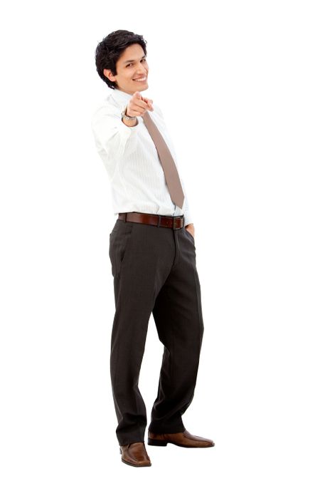 Confident business man pointing to the camera isolated over a white background