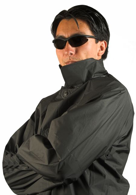man wearing sunglasses and a dark coat