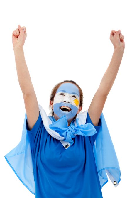 Patriotic Argentinean woman with the flag painted on her face and arms up - over a white background