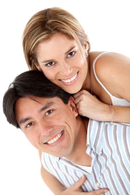 Lovely couple smiling - isolated over a white background