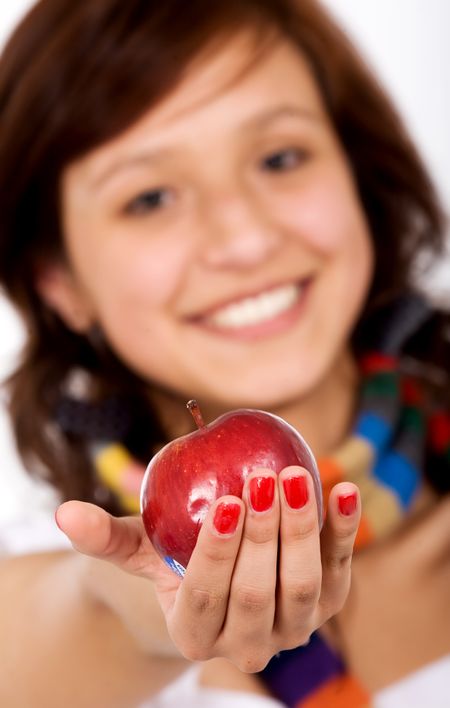 beautiful girl holding an apple in her hand