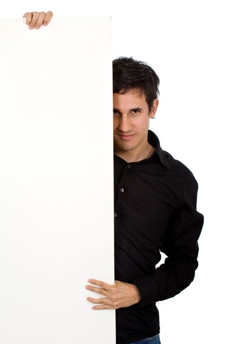 casual man behind a white board isolated over a white background