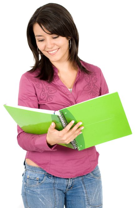 female student reading a notebook over a white background