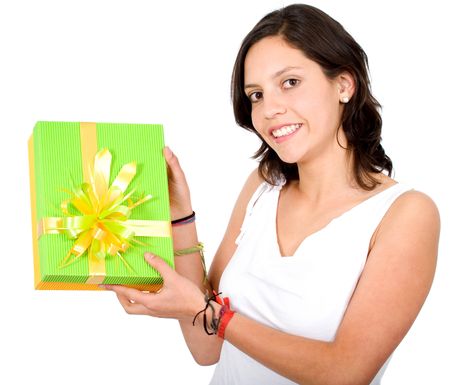 casual girl with a green gift - smiling over a white background