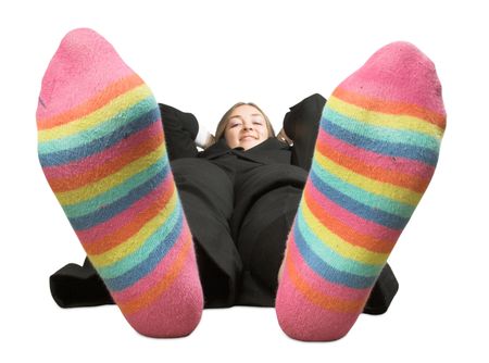 beautiful business woman taking a break with her shoes off